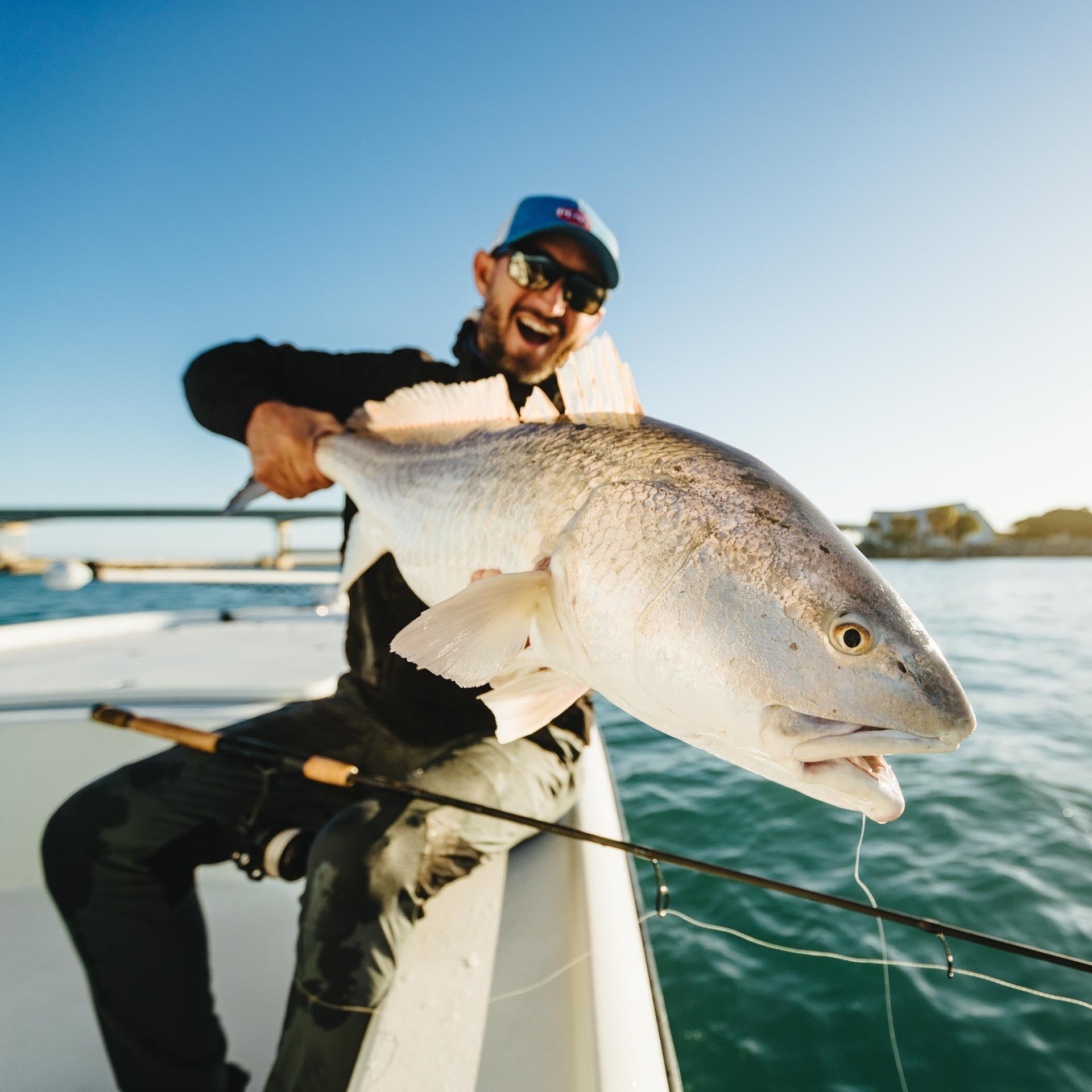 Man holding large fish